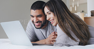Buy stock photo Laptop, laugh and couple on bed in home with watching movie, film or series together on weekend. Happy, technology and man with woman streaming show on website for bonding in bedroom at apartment.