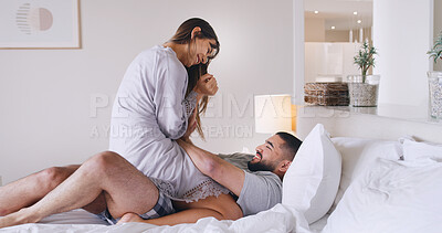 Buy stock photo Love, smile and intimate couple in bedroom for bonding, happiness and connection with partner. Bed, man and woman in home for romantic moment, commitment or healthy relationship with care in morning