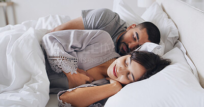 Buy stock photo Couple, hug and sleeping in bed together for love, rest and comfortable in home on weekend. People, bedroom and security in embrace for bonding, nap and morning for cuddle and relaxing or dreaming