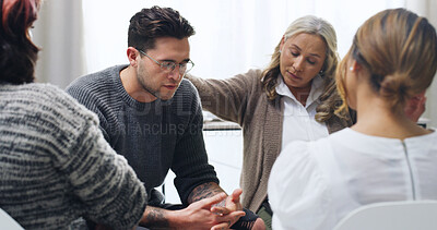 Buy stock photo Support group, empathy and sad man in therapy for mental health, hope or healing depression. Psychology, comfort people and counseling with kindness, help and care with trauma in community center