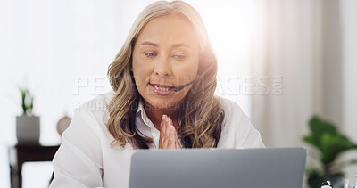 Buy stock photo Therapist, headset and video call with laptop in office for expert advice, help and support. Psychology, mature woman and virtual consultation at clinic for healing tips, online counseling and flare