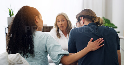 Buy stock photo Therapy, couple and people with support for counseling, relationship and help in office. Psychologist, talking and woman comfort man for healing, consultation and marriage reconciliation with care