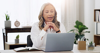 Buy stock photo Therapist, laptop and talking on video call in office for online advice, telehealth and guidance. Psychology, mature woman and headset with virtual consultation for healing support, therapy and help