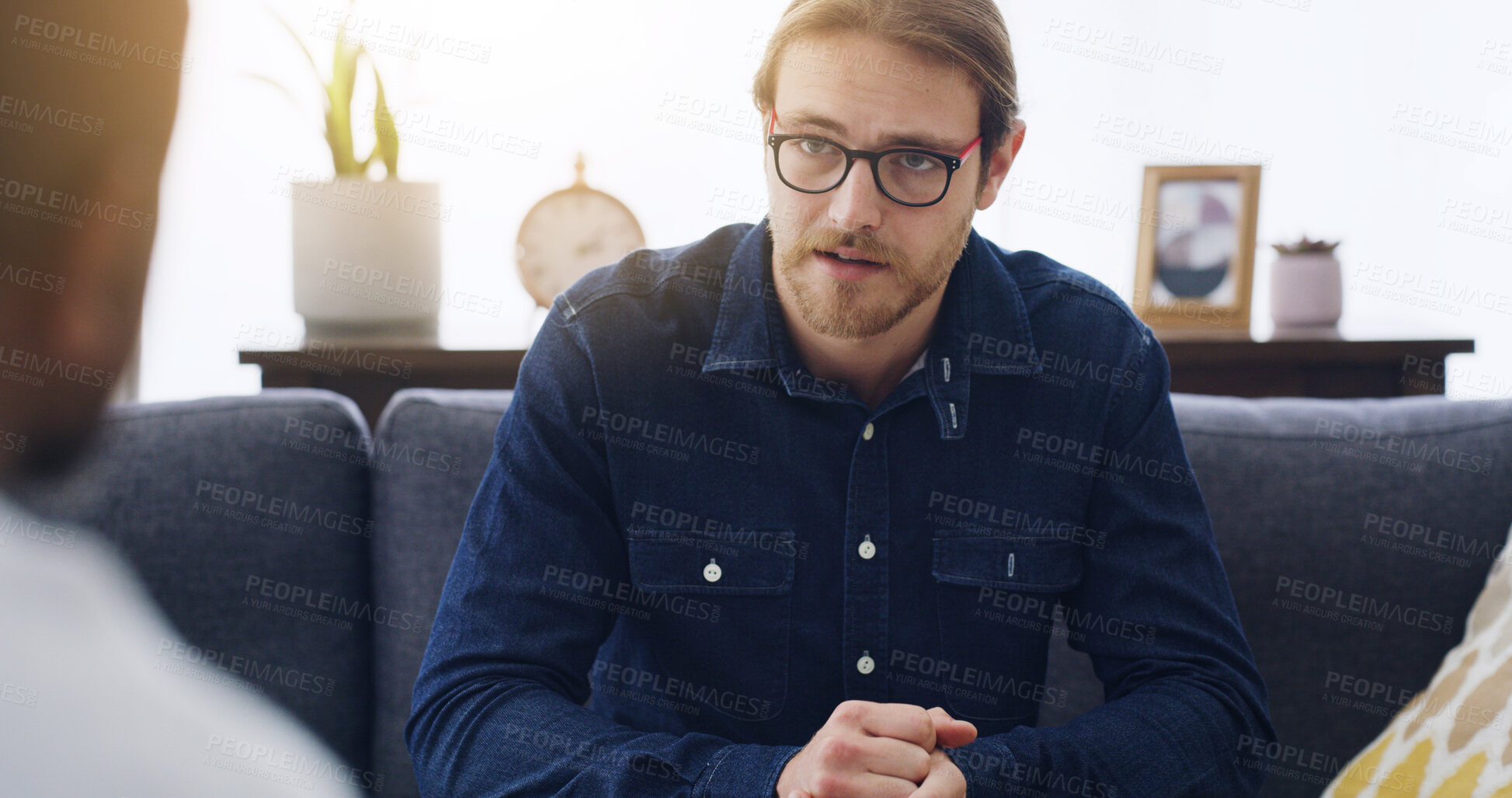 Buy stock photo Man, talk and consultation with psychologist for mental health, assessment and support at clinic. Person, therapist and discussion for tips with counseling for anxiety, insight or advice for wellness