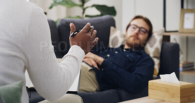 Buy stock photo Hand, psychologist and consultation with patient on sofa, assessment and questions at clinic. Person, therapist and discussion for tips with counseling for anxiety, notes and advice for depression
