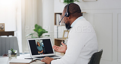 Buy stock photo Man, therapist and video call with laptop screen for counseling or online therapy in home. Male person, psychologist and talking with client, headset or computer for telehealth app or virtual advice