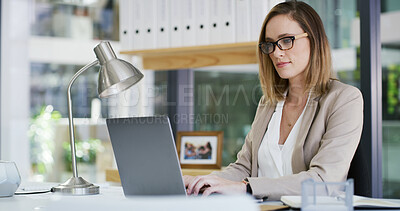 Buy stock photo Business, laptop and typing with accountant woman at desk in office for financial audit or review. Computer, budget and finance with employee person in workplace for bookkeeping or revenue analysis