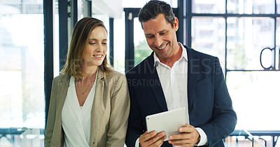 Buy stock photo Businessman, woman and happy with tablet, review and feedback with risk assessment app at company. People, team and tech with smile, discussion and insight for collaboration at insurance agency