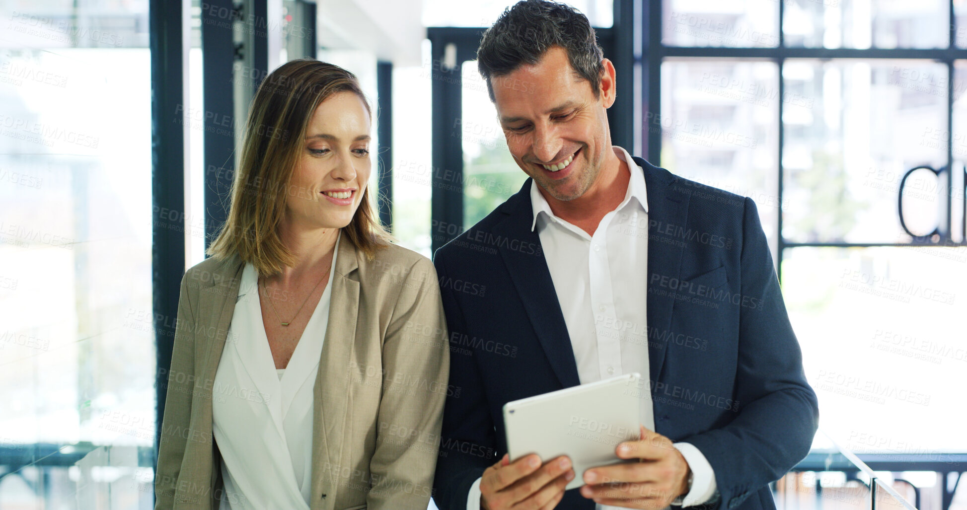 Buy stock photo Businessman, woman and happy with tablet, review and feedback with risk assessment app at company. People, team and tech with smile, discussion and insight for collaboration at insurance agency