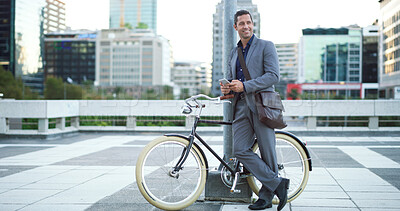 Buy stock photo Bike, idea and phone with businessman in city for eco friendly commute to work location. App, communication and smile of employee planning route or trip with bicycle for zero emission transportation