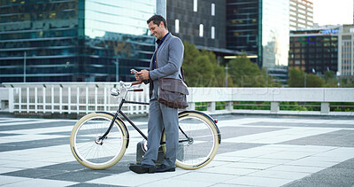 Buy stock photo Bike, phone and business man in city for carbon footprint, communication and eco friendly commute, Sustainability travel, cycling and online with male person outdoor for professional csr journey