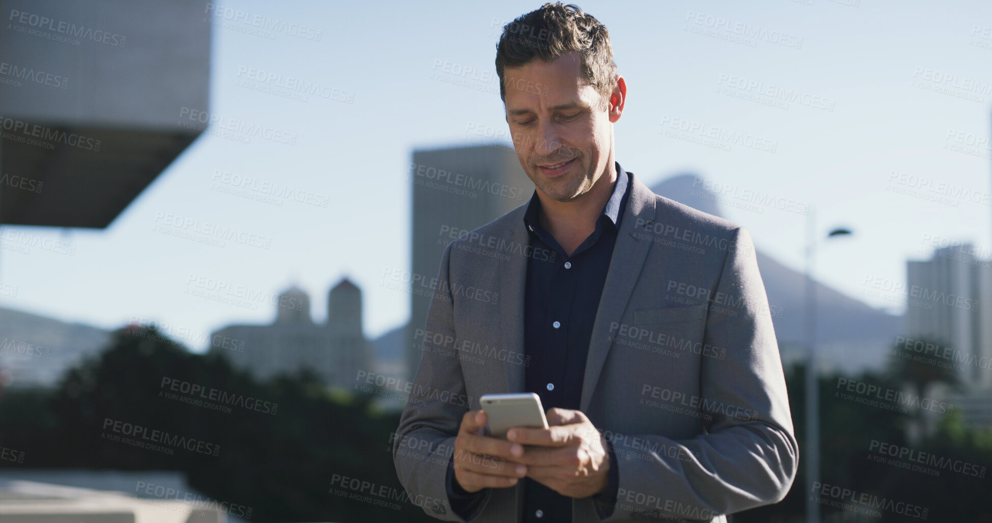Buy stock photo City, commute and phone with business man outdoor for connection, browsing or social media. App, text message and walking with happy corporate employee in urban town for communication or travel
