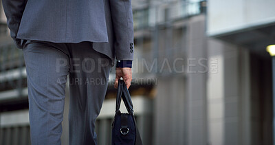 Buy stock photo Businessman, hands or case in city for travel, morning commute or journey to work. Back of professional, bag or walking in town for career opportunity, punctuality or outdoor at urban office building