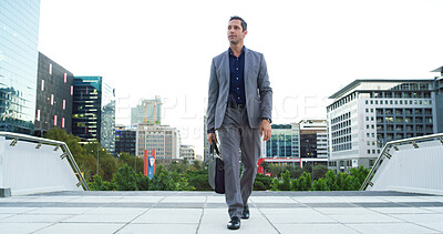 Buy stock photo Business man, thinking and walking in city for property viewing, idea and planning outdoor. Urban development, male realtor and mature real estate investment with suitcase for commute and opportunity