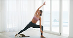 Woman, warm up and exercise for yoga at house for preparation, flexibility and body balance. Female person, stretching and yogi routine with physical fitness, holistic mobility and breathing control