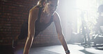 Athlete, woman and pushup with exercise at gym for fitness, strength training and workout. Female person, body balance and hard work for bodybuilding, core activity and resilience with strong muscle