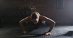 Woman, bodybuilder and pushup with exercise at gym for fitness, strength training and workout. Female person, body balance and hard work for endurance, core activity and resilience with strong muscle