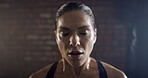 Fitness, tired and woman with sweating at gym for intense workout, exercise recovery and burnout. Athlete, breathing and exhausted at sports center for wellness challenge, resting or training fatigue