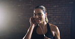 Music, smile and workout with woman in gym for streaming fitness playlist, health and audio. Wellness podcast, happiness and athlete or person with earphones in sports club for exercise or radio