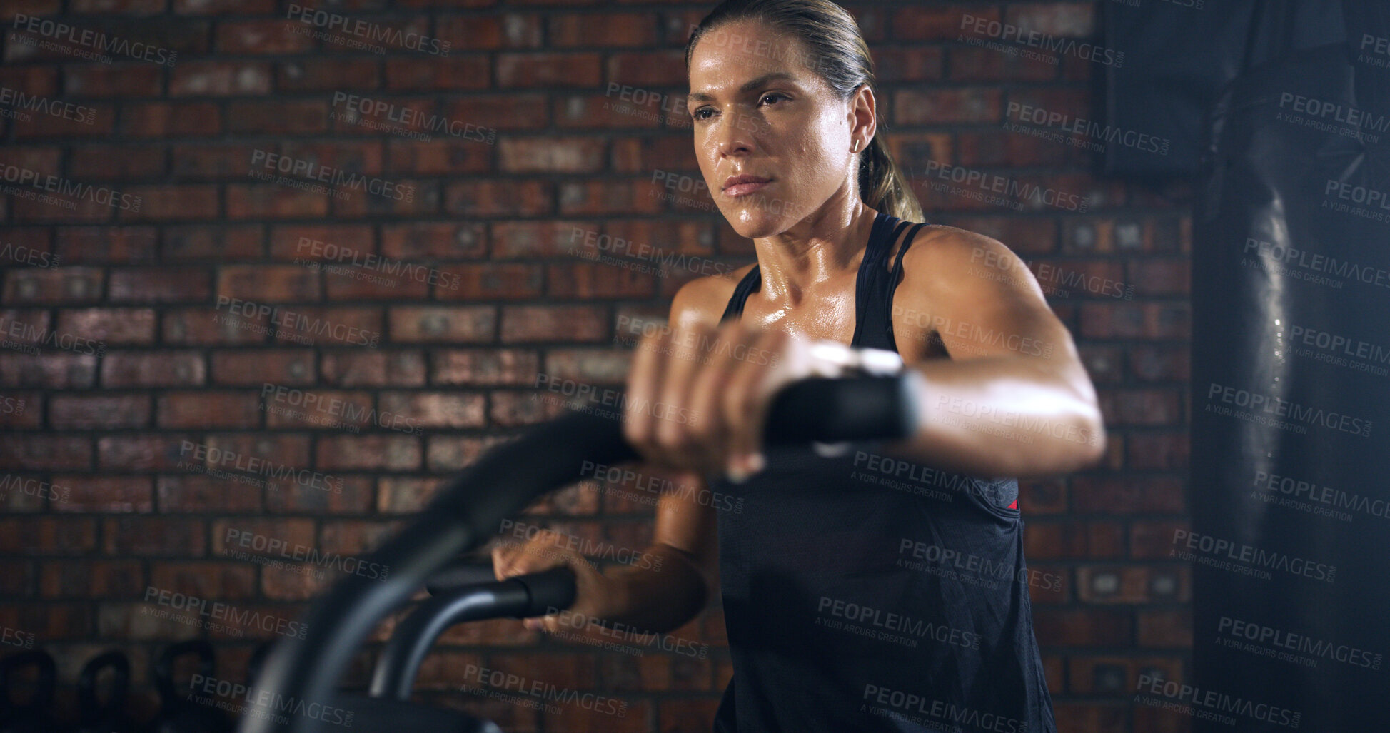 Buy stock photo Thinking, woman and fitness with bicycle at gym for exercise, intense training and endurance. Female person, sweating and stationary bike for cardio workout, cycling performance and sports challenge