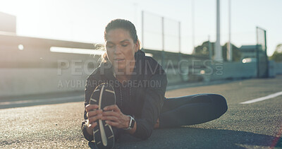Buy stock photo Fitness, woman and stretching legs on road for wellness, health or exercise preparation in city. Sports, runner and warm up hamstring muscle on street for flexibility, challenge or practice outdoor