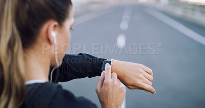 Buy stock photo Runner, smart watch and check with woman in city for performance stats, location tracking and fitness. Health app, stopwatch timer and workout lap with person and wristwatch for heart rate monitor
