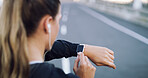 Runner, smart watch and counter with woman in city for performance stats, location tracking and fitness. Health app, stopwatch timer and workout lap with person and wristwatch for heart rate monitor