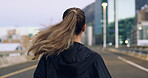 Back view, run and woman in city for exercise, cardio health and wellness outdoor. Race, marathon or endurance training with female runner on urban street for sport, workout and fitness on bridge