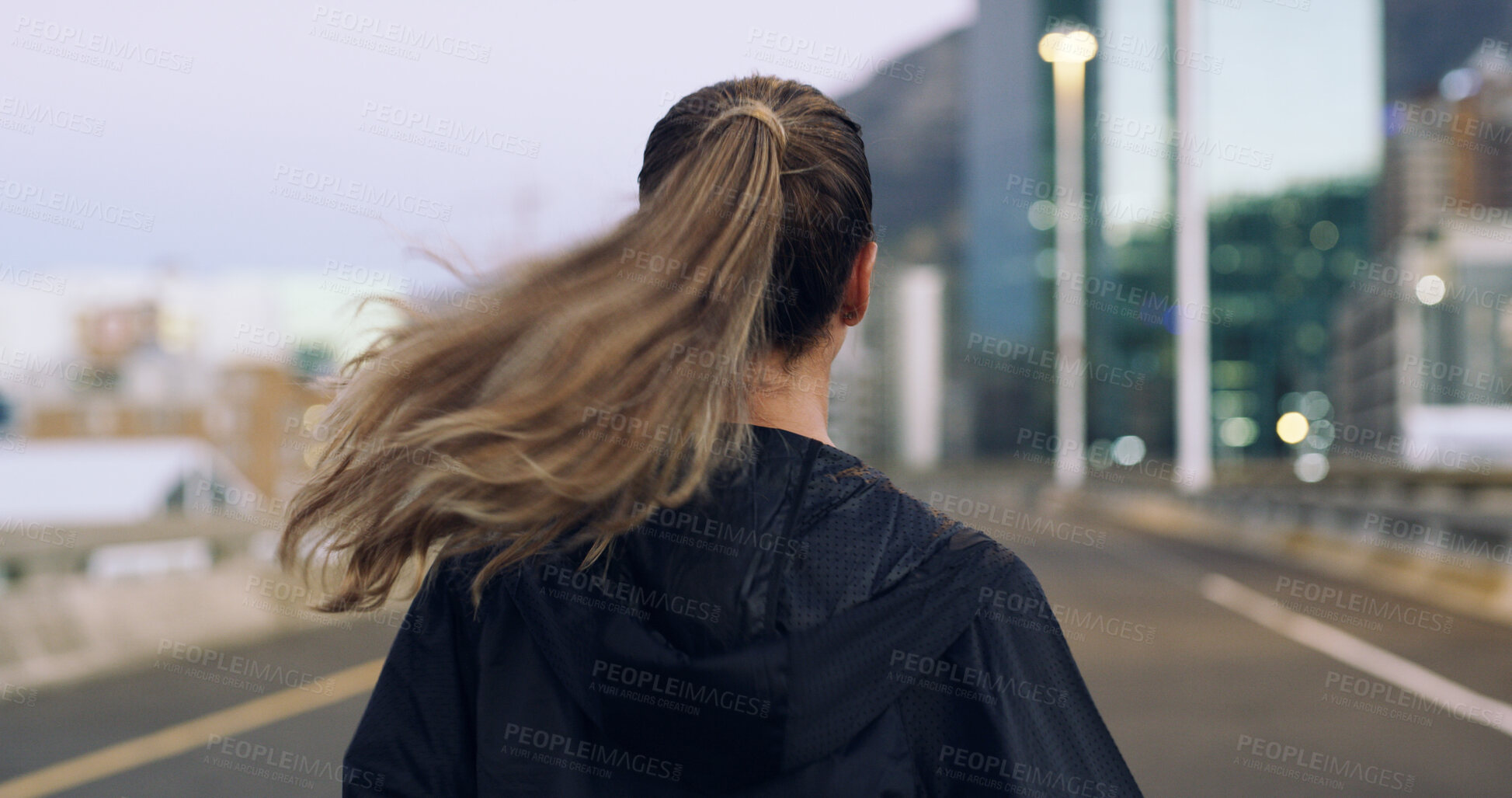 Buy stock photo Back view, run and woman in city for exercise, cardio health and wellness outdoor. Race, marathon or endurance training with female runner on urban street for sport, workout and fitness on bridge