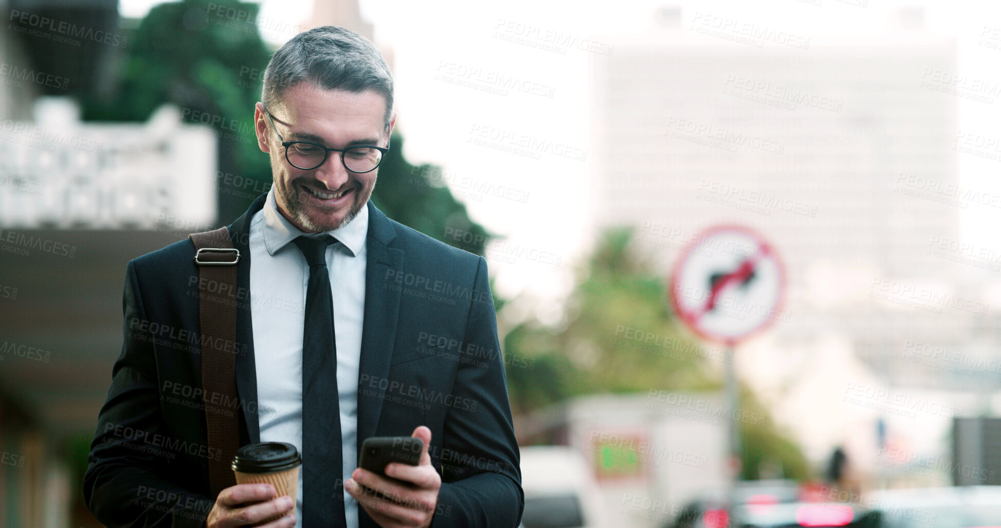 Buy stock photo Businessman, phone and happy in city, texting or notification for good news on commute with coffee. Mature person, smile and smartphone with mobile app, drink and social media on road in Argentina
