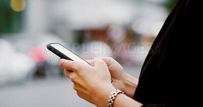 Buy stock photo Hands, woman and typing with phone in city for ride booking, location search or text message. Bokeh, person and smartphone in urban road for online navigation app, contact taxi service or mobile chat