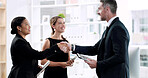 Handshake, teamwork and welcome with business people in office for partnership, greeting and meeting. Success, contract and b2b deal with employees shaking hands for support, thank you and agreement