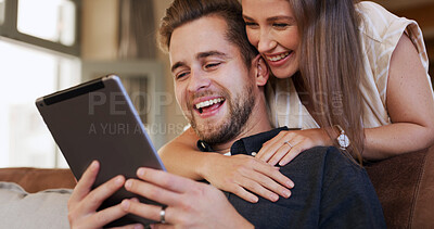 Buy stock photo Excited, couple and browsing with tablet, house or planning for trip, together or bonding in lounge. Online shopping, man and happy with woman, hug and purchase of tickets or booking flight on web