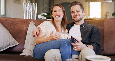 Buy stock photo Popcorn, happy and couple on sofa in house with watching movie, series or show together. Smile, love and man with woman streaming film with snack in living room for date on weekend break in apartment