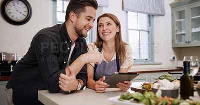 Buy stock photo Cooking, food and happy couple with tablet in kitchen for dinner, supper and meal prep in home. Bonding, help and man with woman on digital tech for online recipe, ingredients and culinary tutorial