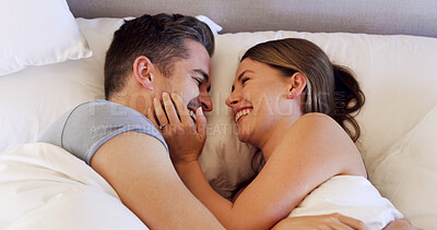 Buy stock photo Love, couple or happy with romance in bed for morning cuddle, lazy weekend or healthy relationship. Trust, people or relax together in bedroom with connection, marriage commitment or security in home