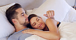 Relax, happy and couple in bed in morning for bonding, relationship and resting on weekend together. Home, bedroom and man with woman for peace, comfortable and embrace with love, affection and care