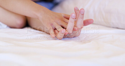 Buy stock photo Couple, holding hands and relax with comfort in bed for love, support or trust together in home. Closeup, people or touch with commitment for relationship, physical connection or bonding on space