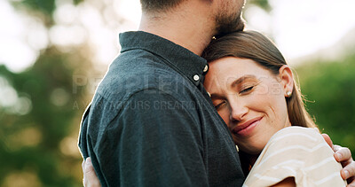 Buy stock photo Happy, love and couple hug in nature for care, bonding and loving relationship on weekend for commitment. Dating, park and man with woman embrace for affection, support and romance together outdoor