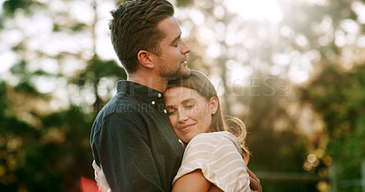 Buy stock photo Happy, nature and couple hug for love, bonding and relationship on weekend outdoor for commitment. Dating, relax and man with woman embrace for affection, support and romance together in park