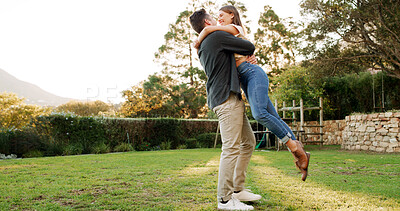 Buy stock photo Couple, lift and hug with care in garden, connection or energy for love, trust and outdoor with romance. Marriage, excited and healthy relationship with man carrying woman for bonding in nature