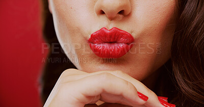 Buy stock photo Pout, lipstick and woman in studio for beauty, makeup and cosmetology with mouth on red background. Lips, kiss face and person with glamour or bold color for luxury cosmetics with aesthetic or glow