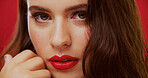 Portrait, lipstick and woman in studio with makeup, beauty and cosmetology with face on background. Red lips, female person with glamour or bold color for luxury cosmetics with aesthetic and glow