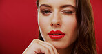 Wink, lipstick and woman in studio with makeup, beauty and cosmetology on background. Red lips, female person and model with flirt, mockup space and luxury cosmetics for aesthetic and glow or shine