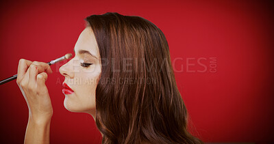 Buy stock photo Woman, makeup brush and eyeshadow in studio for beauty with profile, tools and process on red background. Girl, cosmetic product and application for powder, change and aesthetic with mockup space