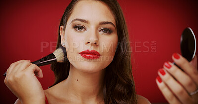 Buy stock photo Woman, makeup brush and studio portrait for beauty with foundation, tools or mirror on red background. Girl, cosmetics product and application with powder for transformation, glow and pride in France