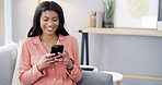 Smile, black woman and rest with phone at house for communication, social media and website. Happy, female person and mobile for research, surfing internet and texting contact with chat notification