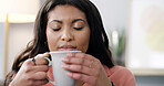 Smelling, coffee and woman in home, relax or scent of warm beverage, morning or liquid in apartment. Inhale, aroma and black person with hot chocolate, calm and peace with drink, break and house