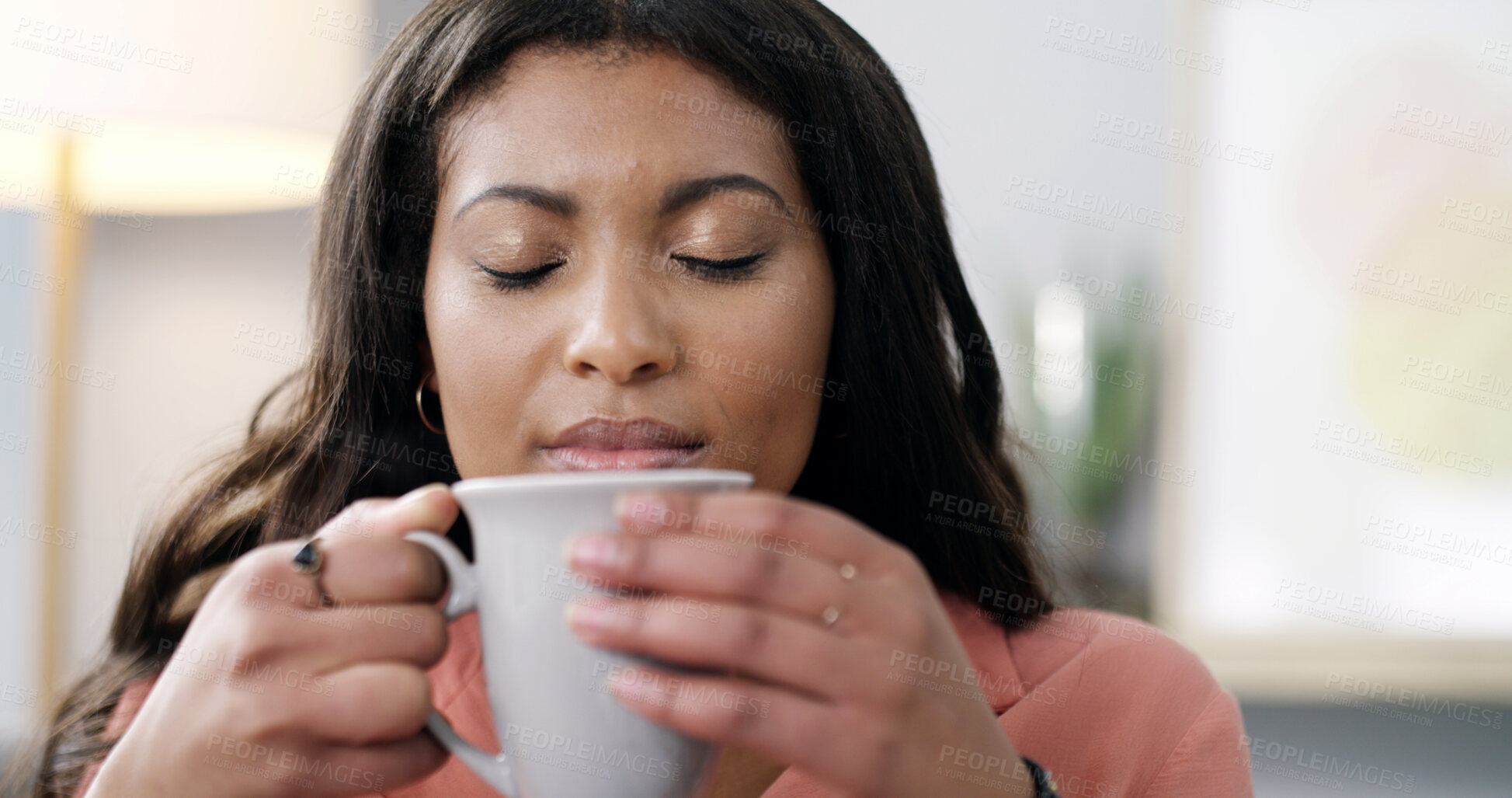 Buy stock photo Smelling, coffee and woman in home, relax or scent of warm beverage, morning or liquid in apartment. Inhale, aroma and black person with hot chocolate, calm and peace with drink, break and house