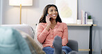 Phone call, happy and woman in living room for listening, talking and connection. Home, communication and African person on mobile for conversation, gossip story or chat with contact for news on sofa